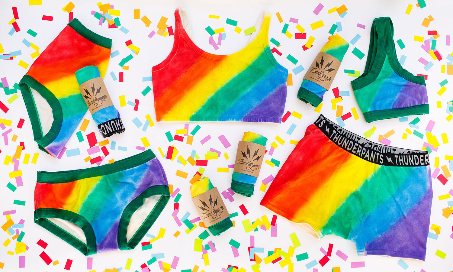 Flat lay of organic cotton Thunderpant styles in rainbow print.