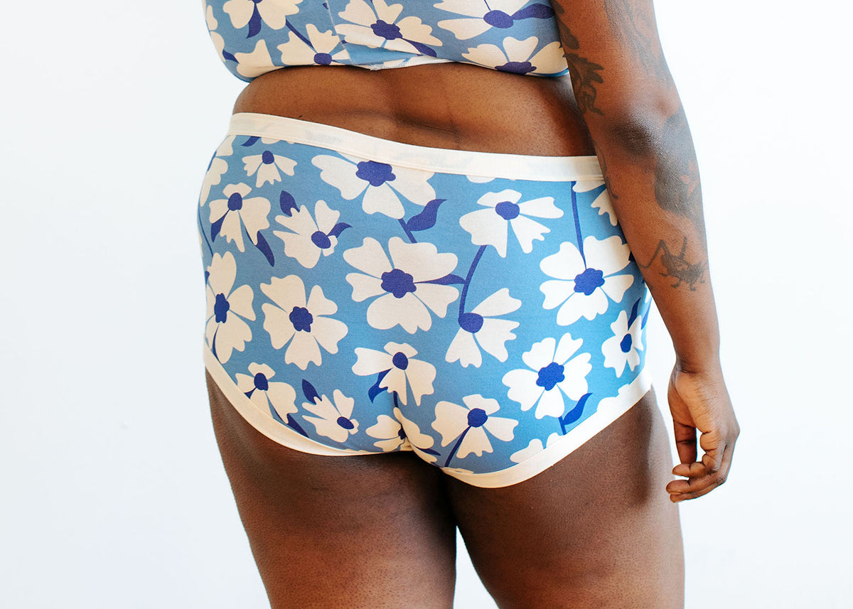 Close up of Thunderpants Original style underwear in Moody Blooms - blue and white flowers.