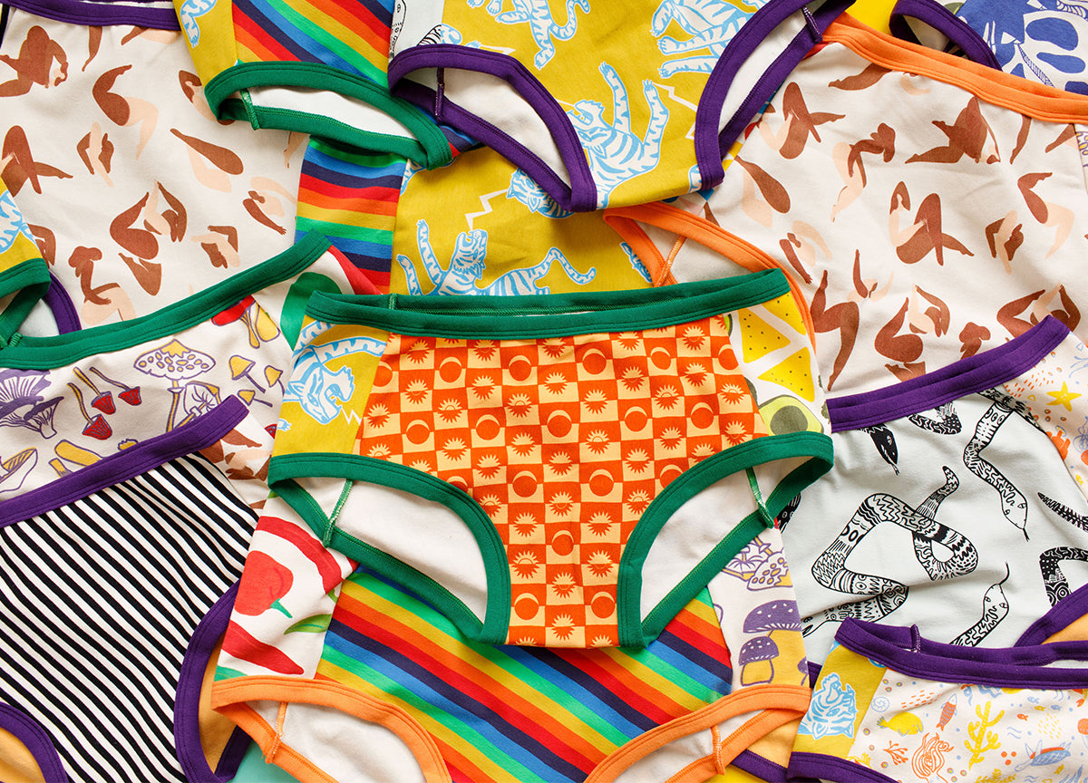 Various prints in different colors laying on top of eachother in our Original and Hipster Panel Pant style underwear.