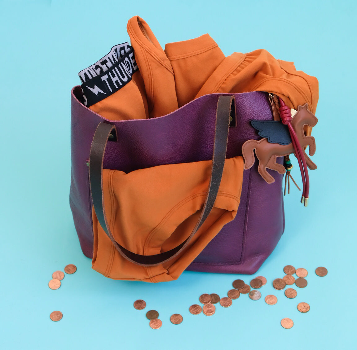A purse with pennies and underwear in the color Lucky Penny