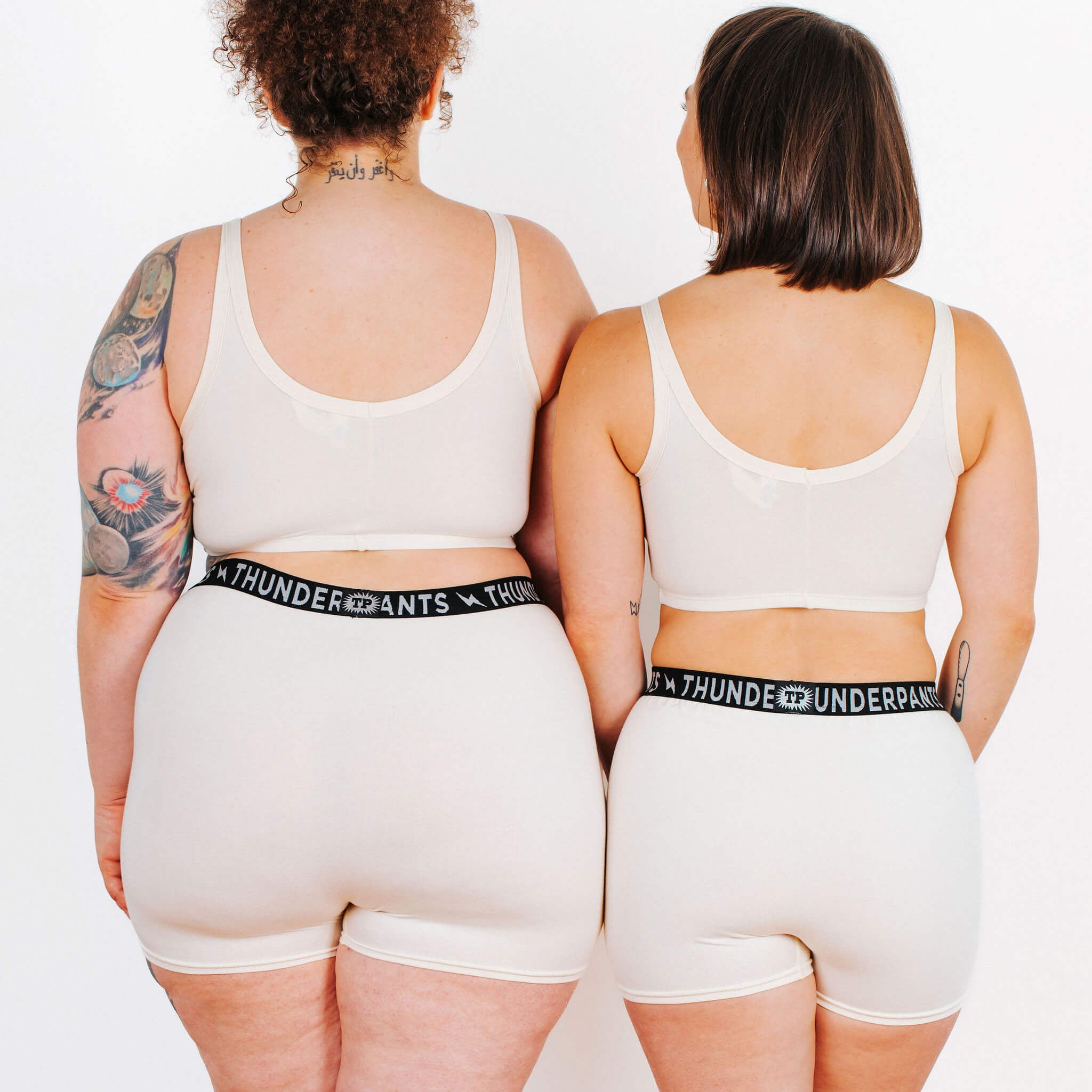 Photo of two models from the back in Thunderpants organic cotton Boxer Brief underwear style in Plain Vanilla. 