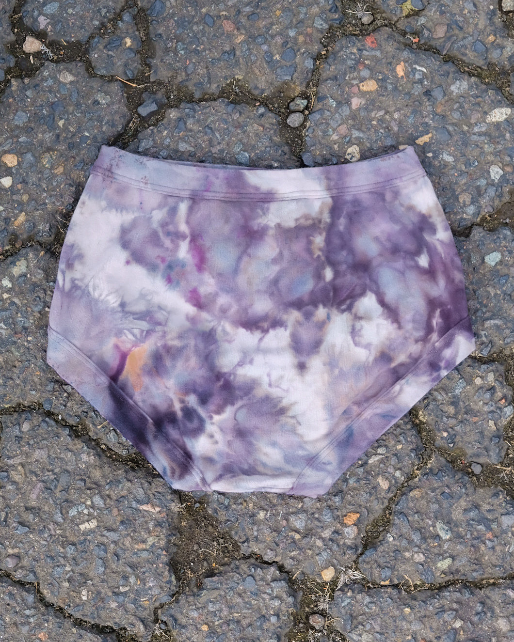 Flat lay of Thunderpants Original style underwear in Haunted Haze Ice Dye - purply grey dye pattern.