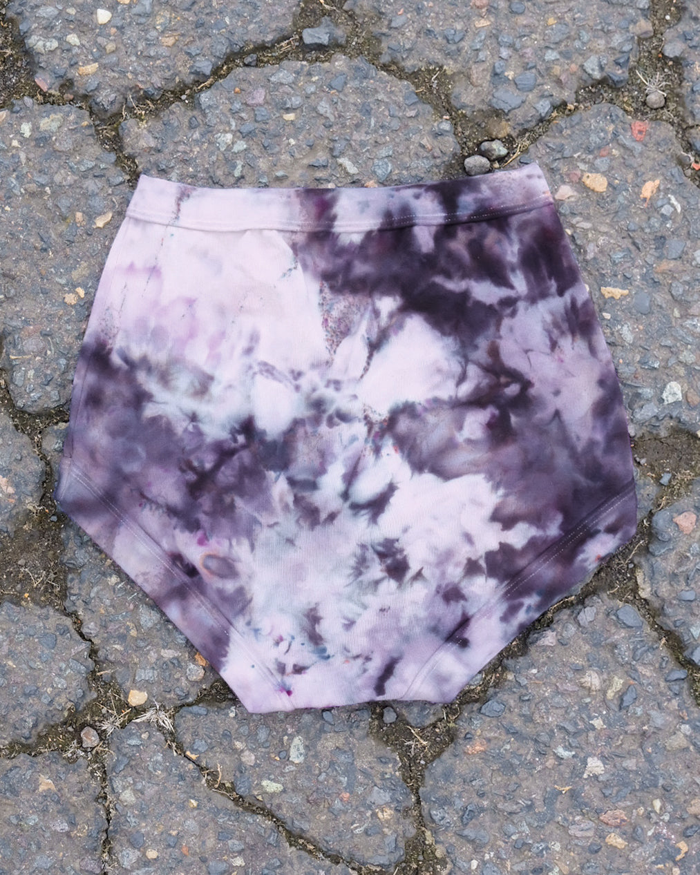 Flat lay of Thunderpants Sky Rise style underwear in Haunted Haze Ice Dye - purply grey dye pattern.