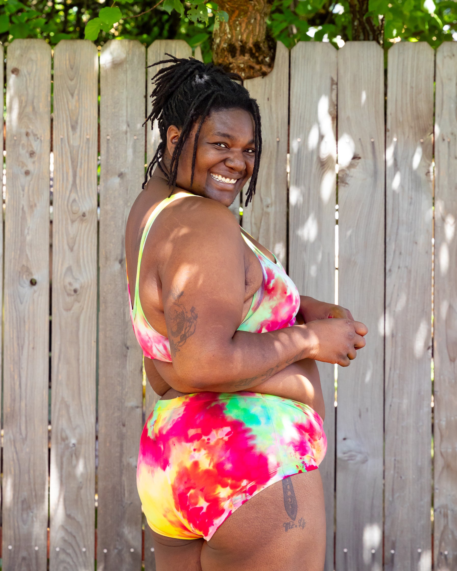 Model wearing Thunderpants Hipster style underwear and Bralette in Summer Crush Ice Dye - pinks, blues, yellows.