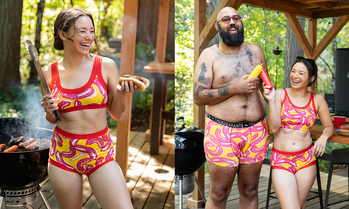 Models wearing various items in Hot Dawg! print - pink, red, and yellow sausage print.