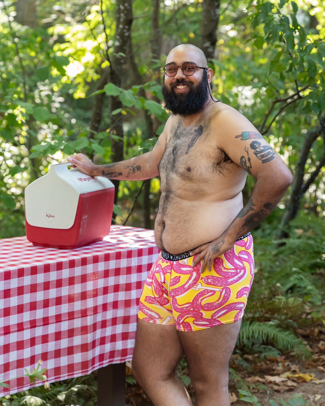 Models wearing Thunderpants Boxer Brief style underwear in Hot Dawg! print - pink sausages on yellow background and red binding.