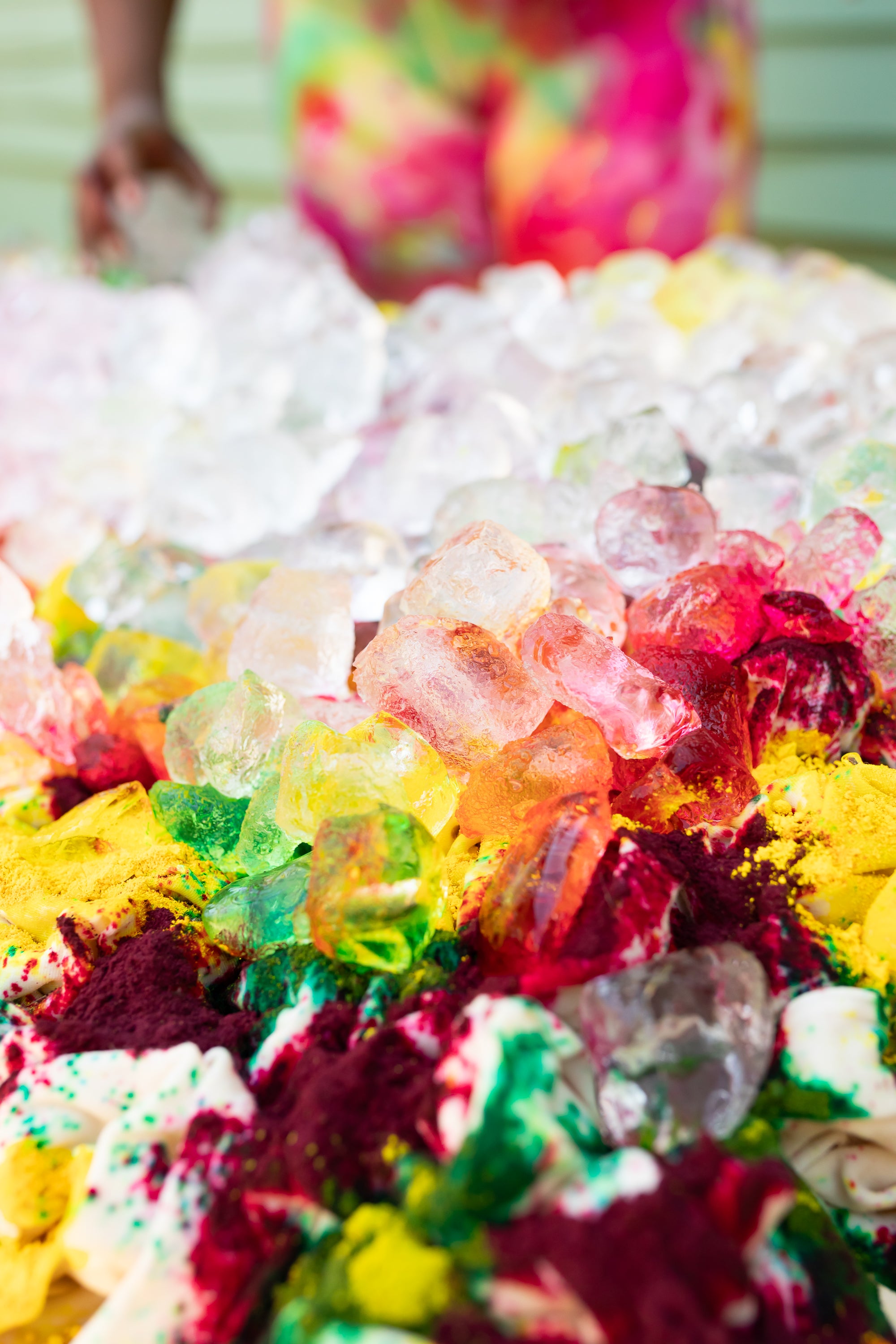 Ice on top of colored dye powder on bunched up underwear.