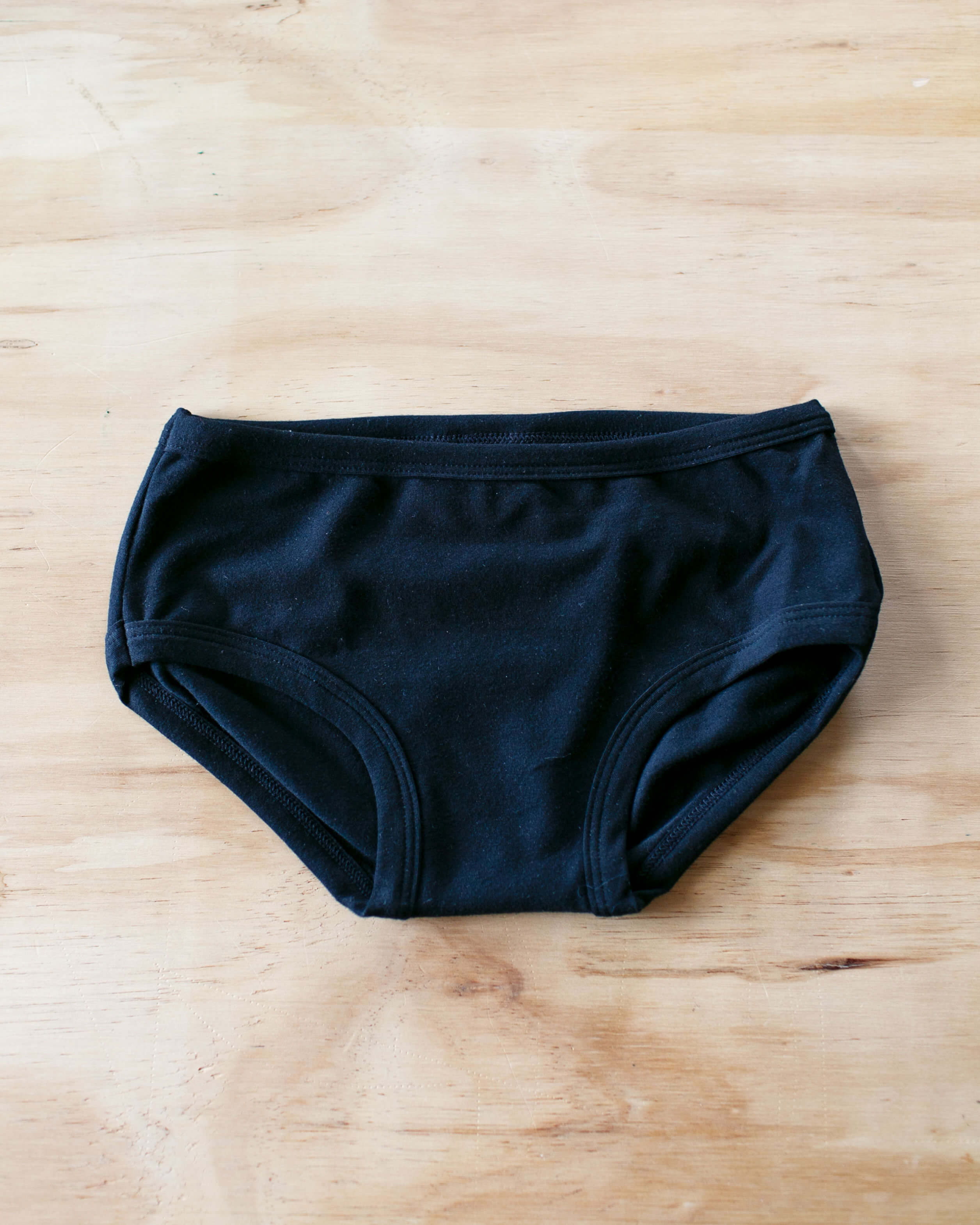 Flat lay of Thunderpants Kids Original style underwear in Plain Black.