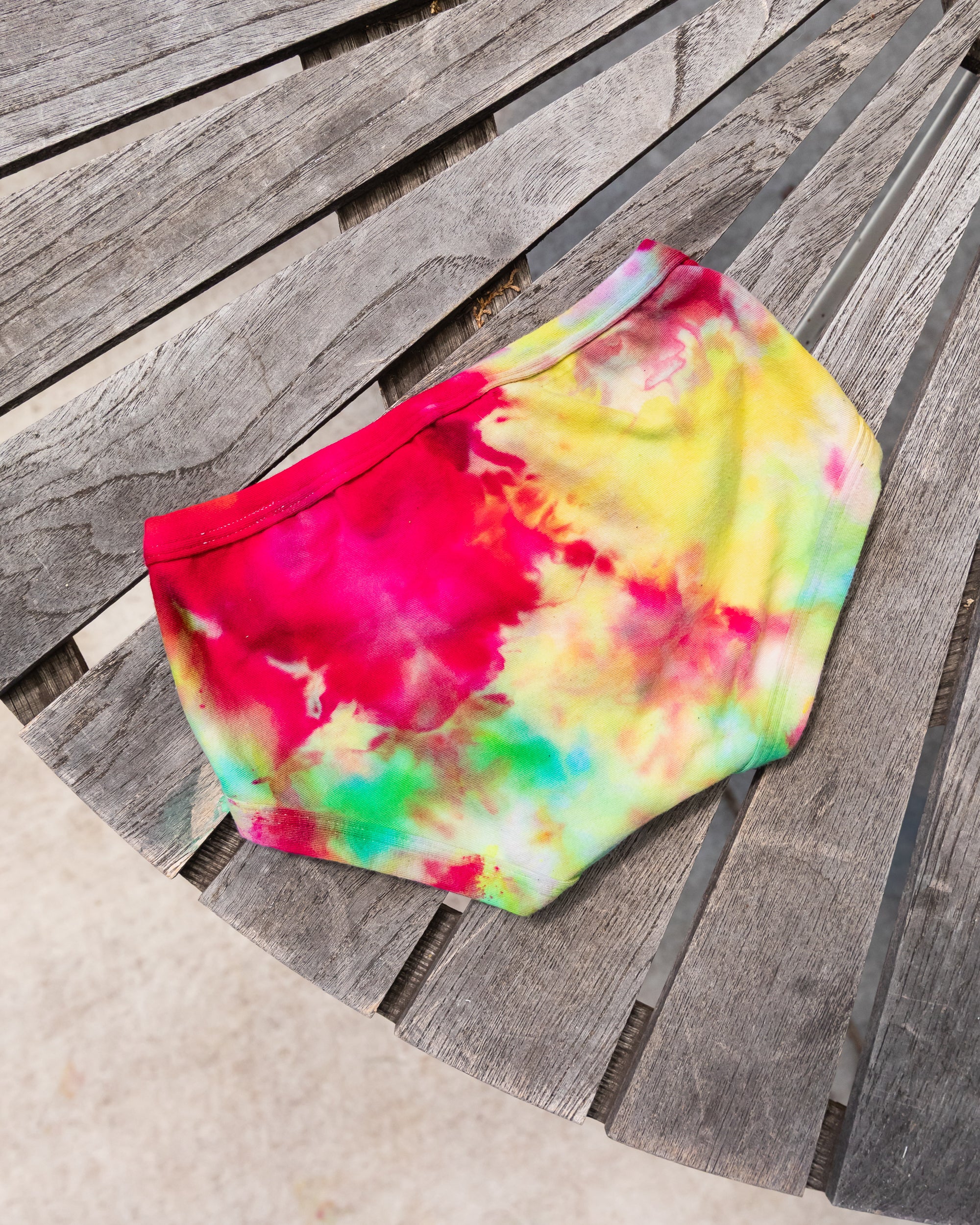 Flat lay of Thunderpants Kid's style underwear in Summer Crush Ice Dye - pinks, blues, yellows. 