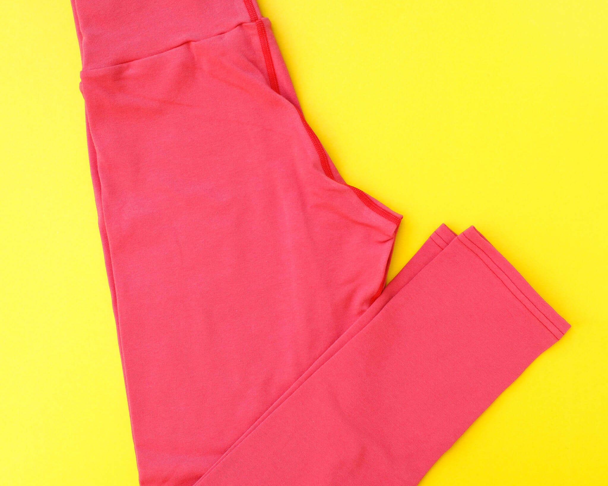 Flat lay of Thunderpants Ankle Length Leggings in Pomegranate Punch.