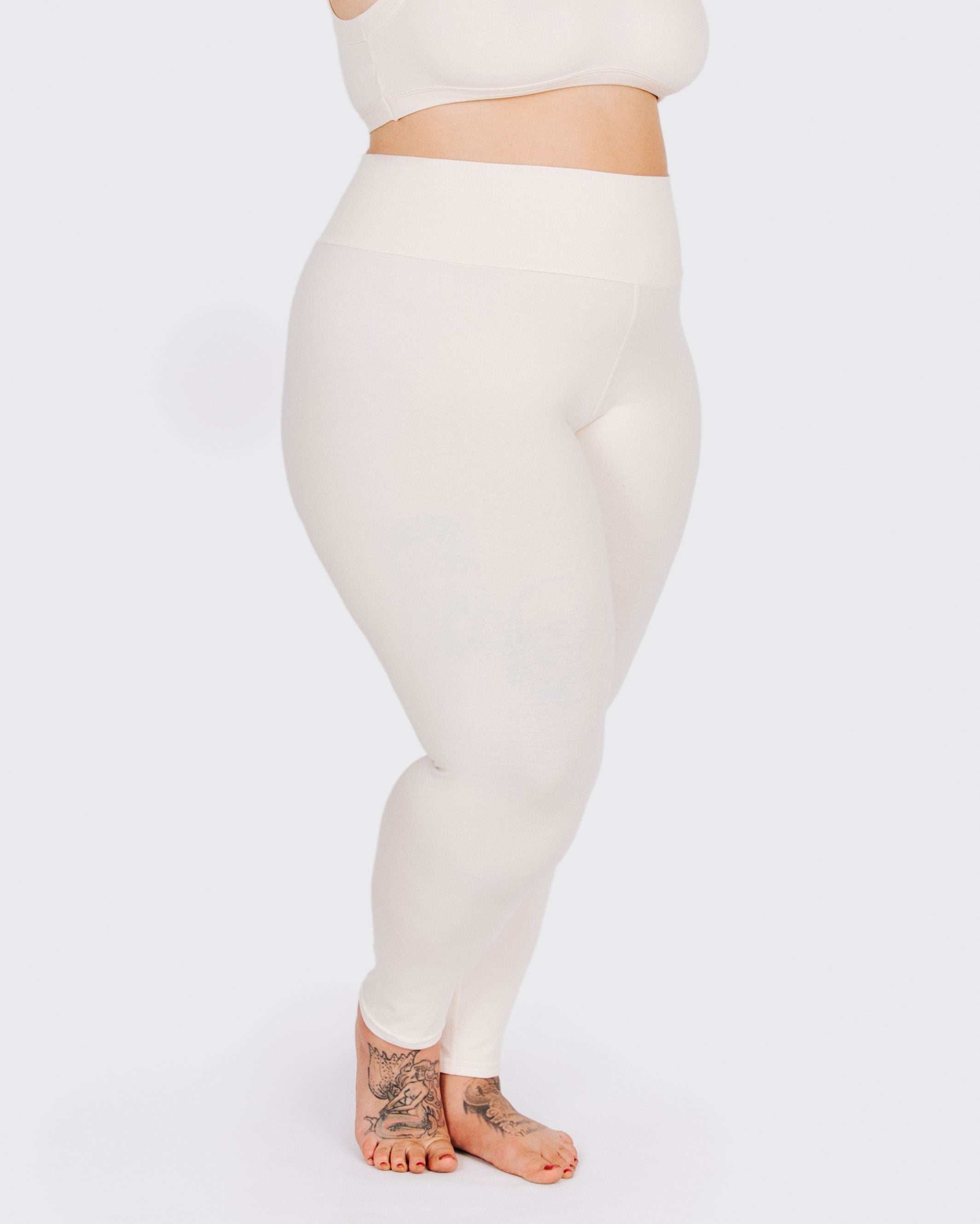 Fit photo from the front of Thunderpants organic cotton Leggings in off-white on a model.