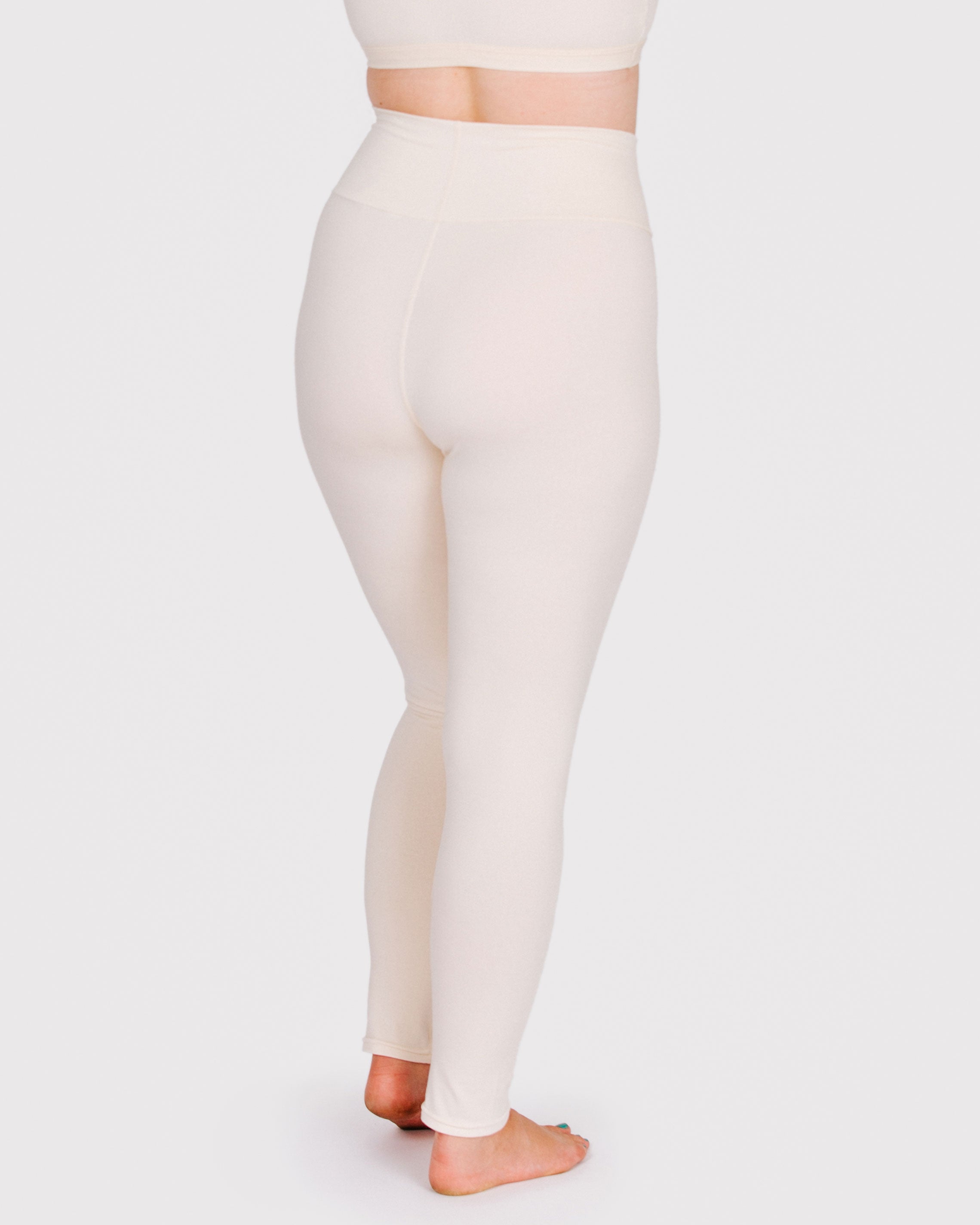 Fit photo from the back of Thunderpants organic cotton Leggings in off-white on a model.
