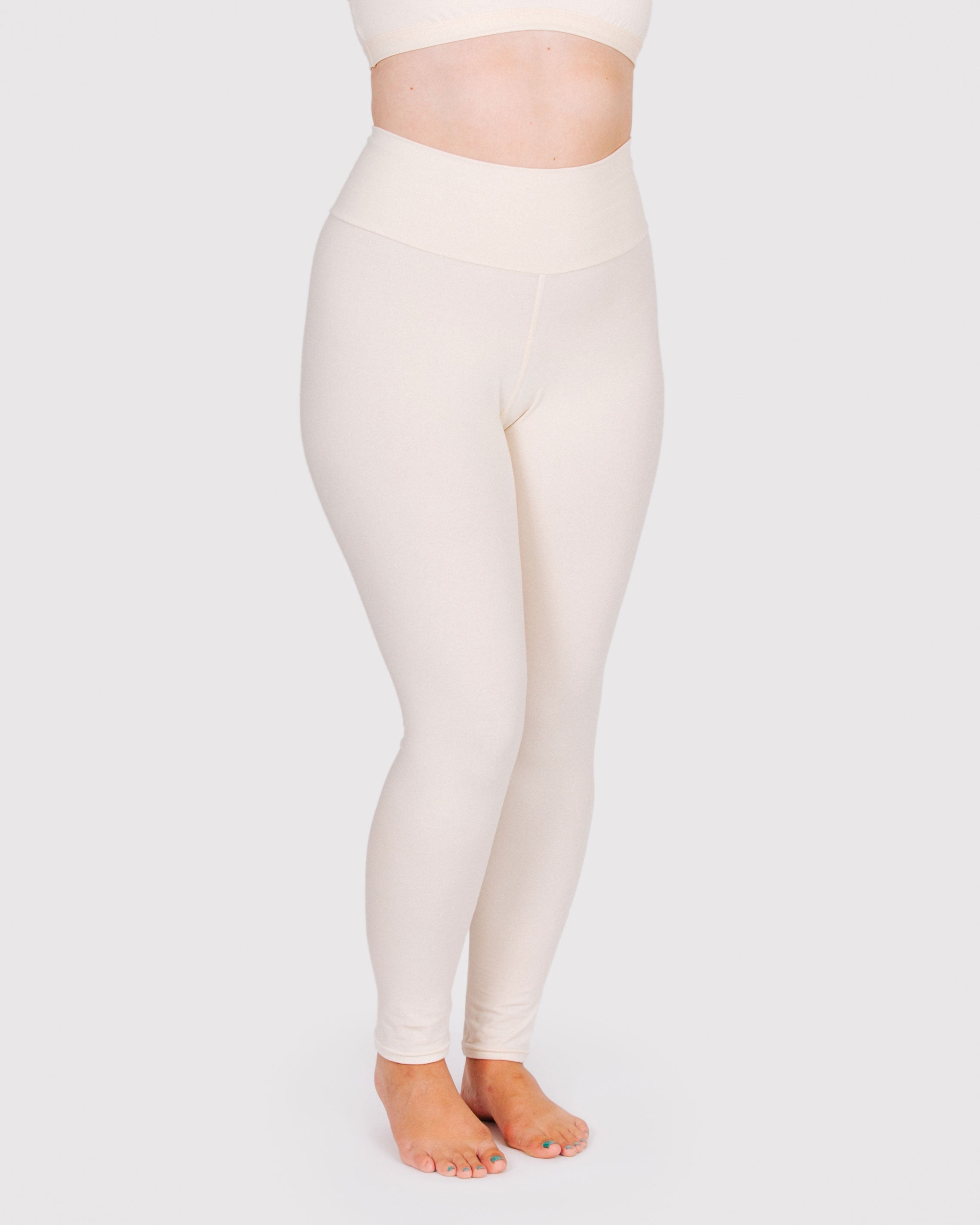 Fit photo from the front of Thunderpants organic cotton Leggings in off-white on a model.