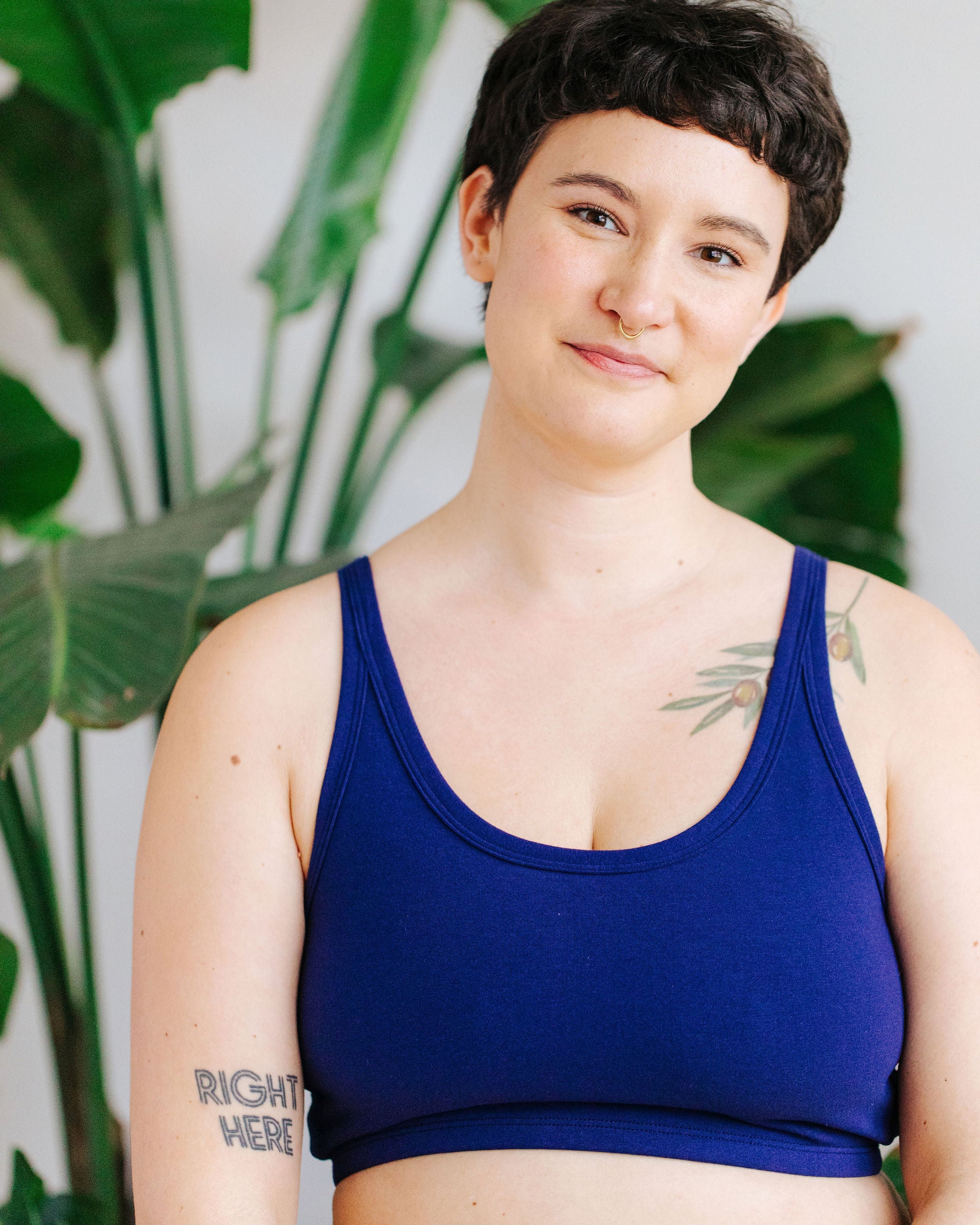 Model wearing Thunderpants Longline Bra  in Indigo Blue.