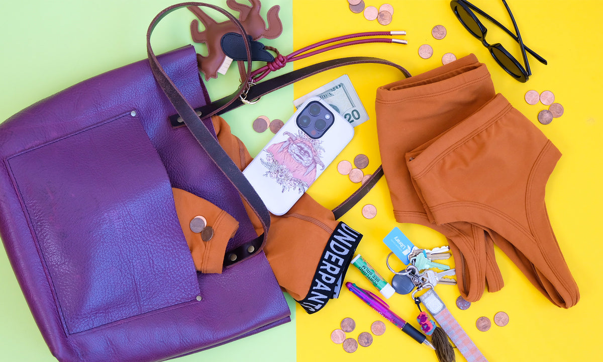 A purse spilled with pennies and underwear in the color Lucky Penny.