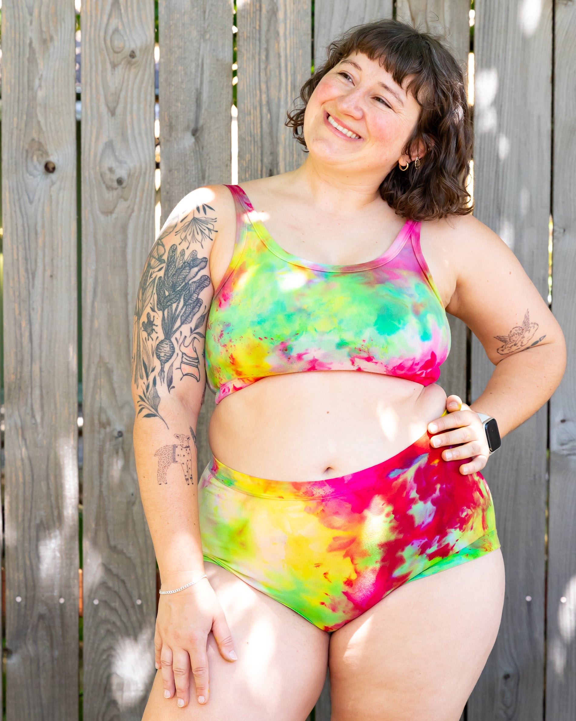 Model wearing Thunderpants Original style underwear and Longline Bra in Summer Crush Ice Dye - pinks, blues, yellows. 