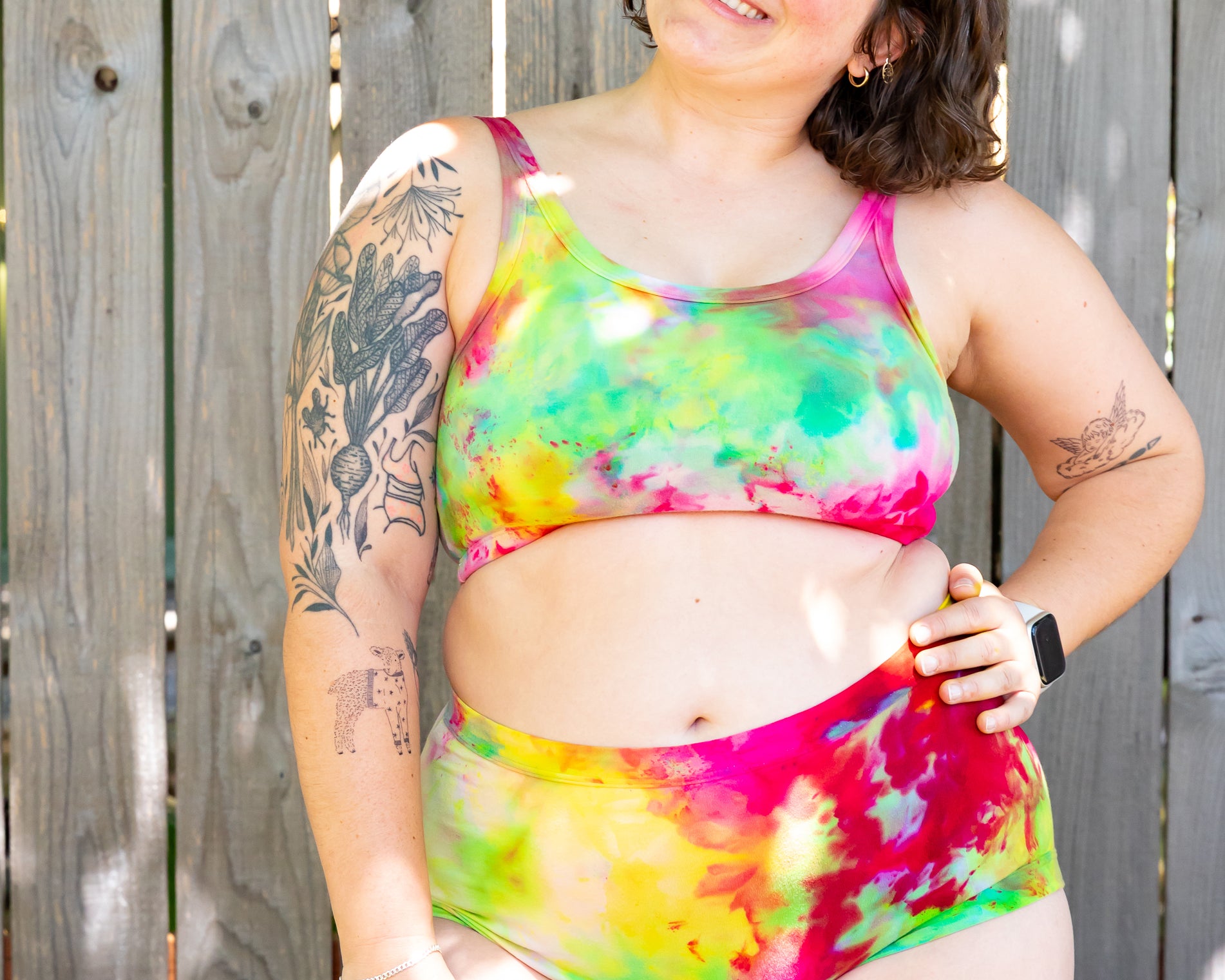 Model wearing Thunderpants Original style underwear and Longline Bra in Summer Crush Ice Dye - pinks, blues, yellows. 