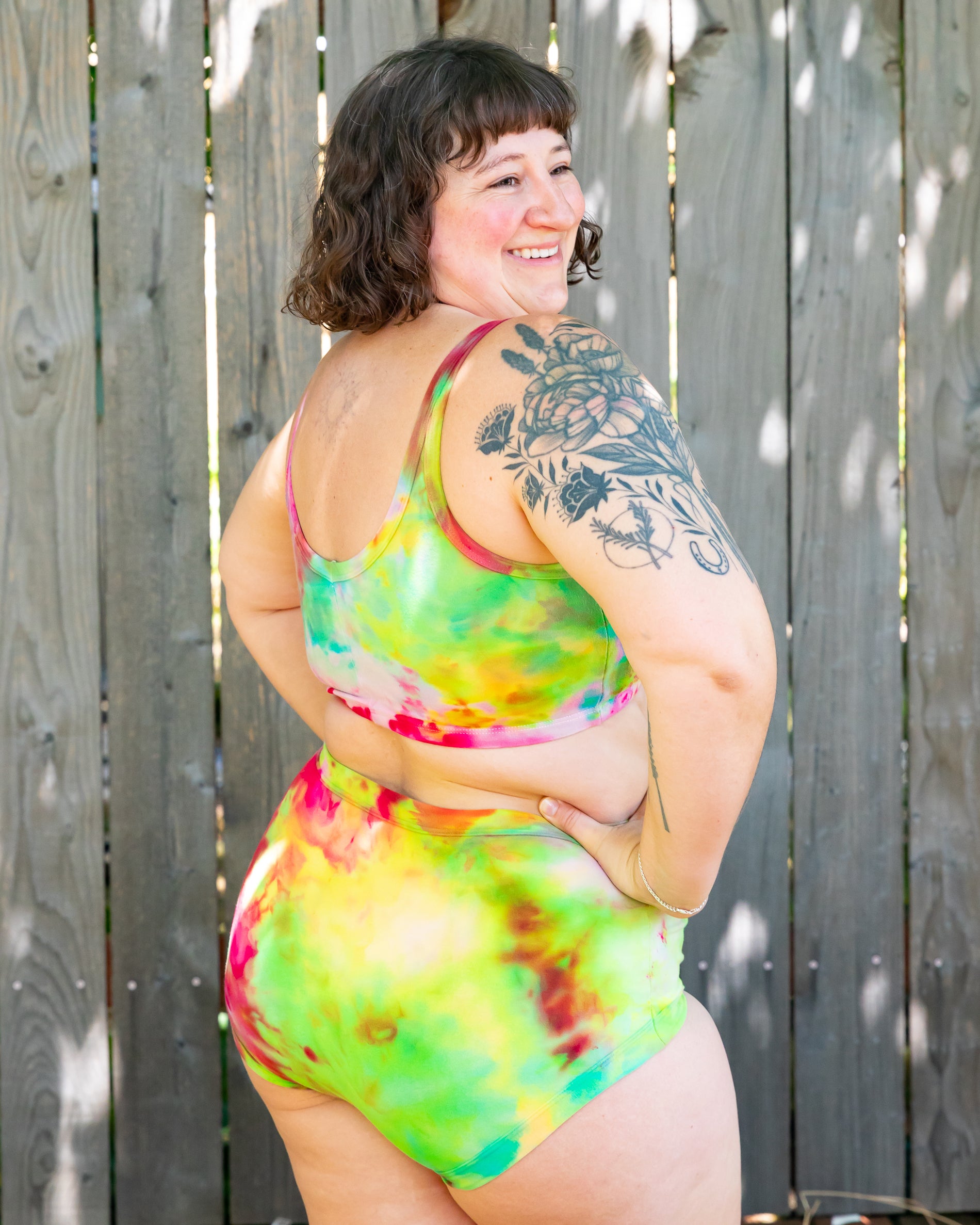 Model wearing Thunderpants Longline Bra and Original style underwear in Summer Crush Ice Dye - pinks, blues, yellows. 
