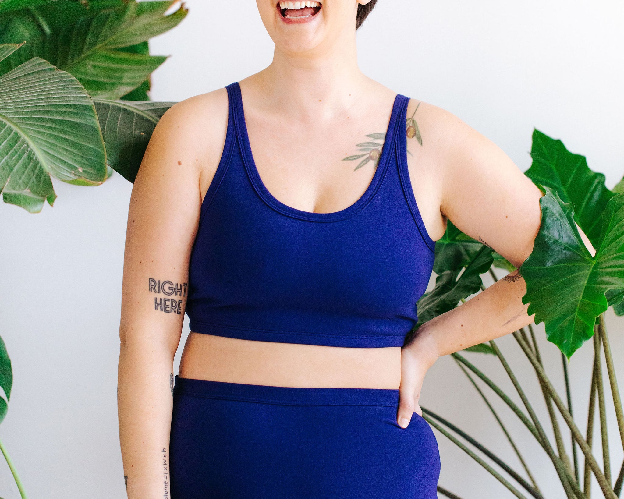 Model wearing Thunderpants Sky Rise style underwear and Longline Bra in Indigo blue.