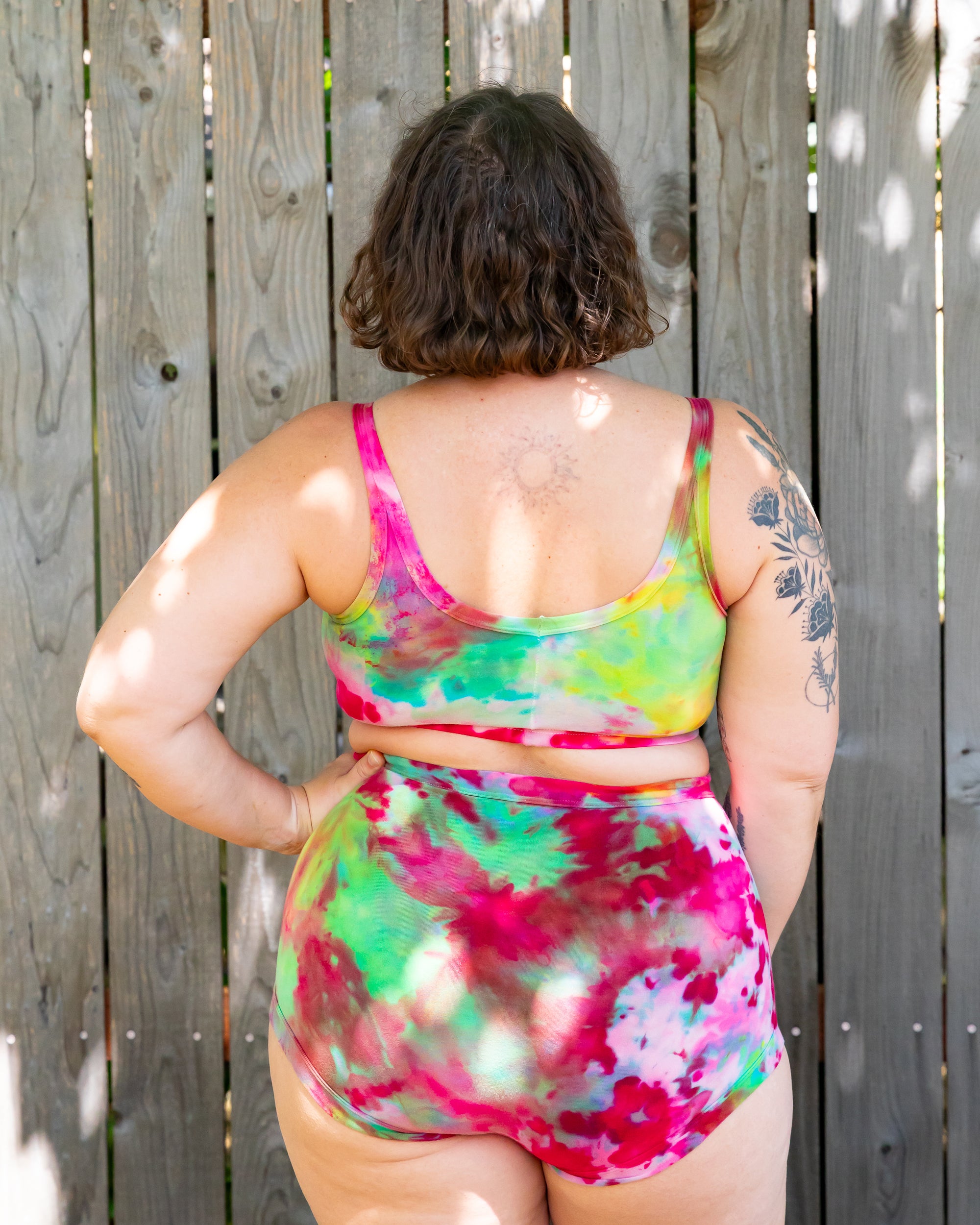 Model wearing Thunderpants Sky Rise style underwear and Longline Bra in Summer Crush Ice Dye - pinks, blues, yellows. 