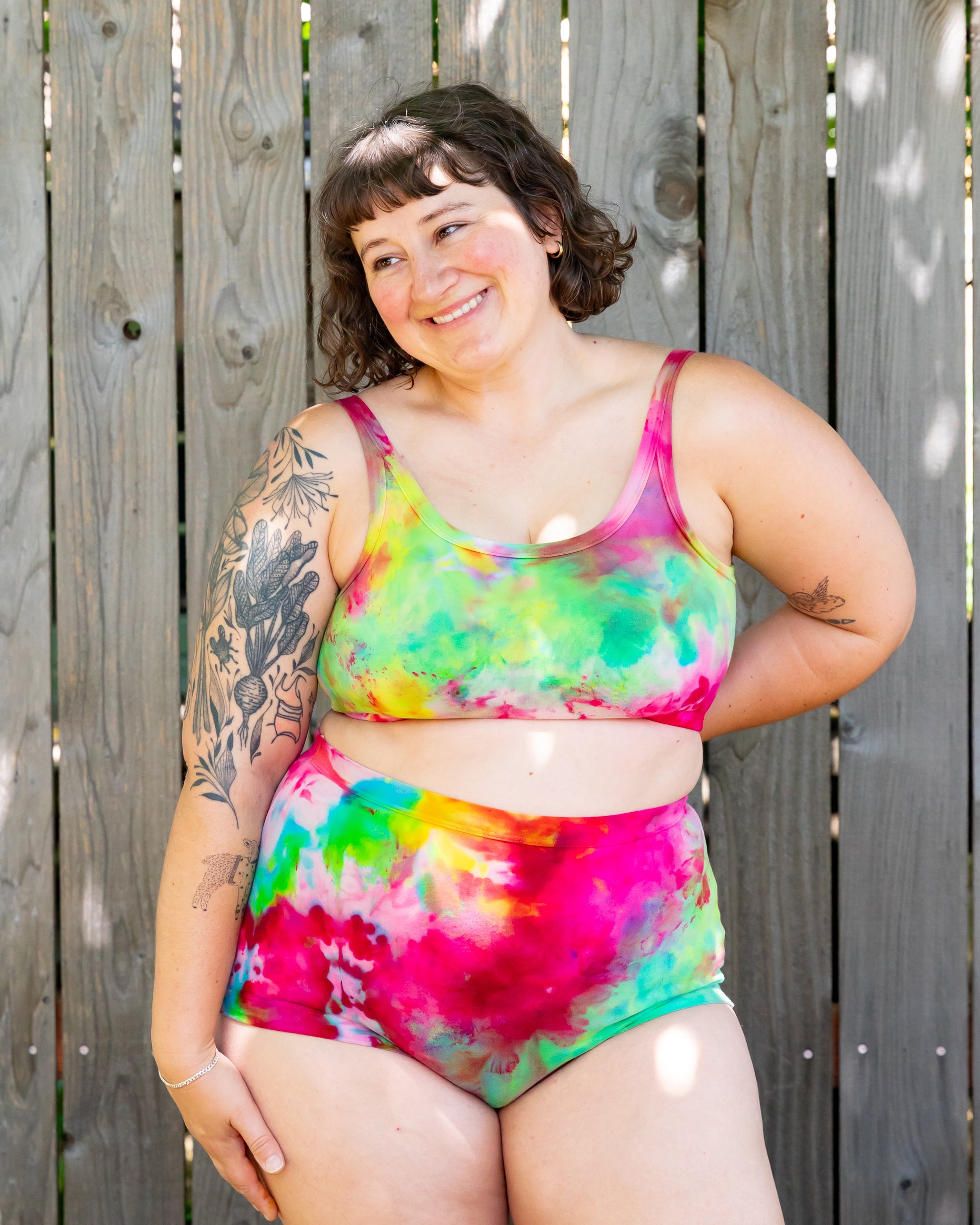 Model wearing Thunderpants Sky Rise style underwear and Longline Bra in Summer Crush Ice Dye - pinks, blues, yellows. 