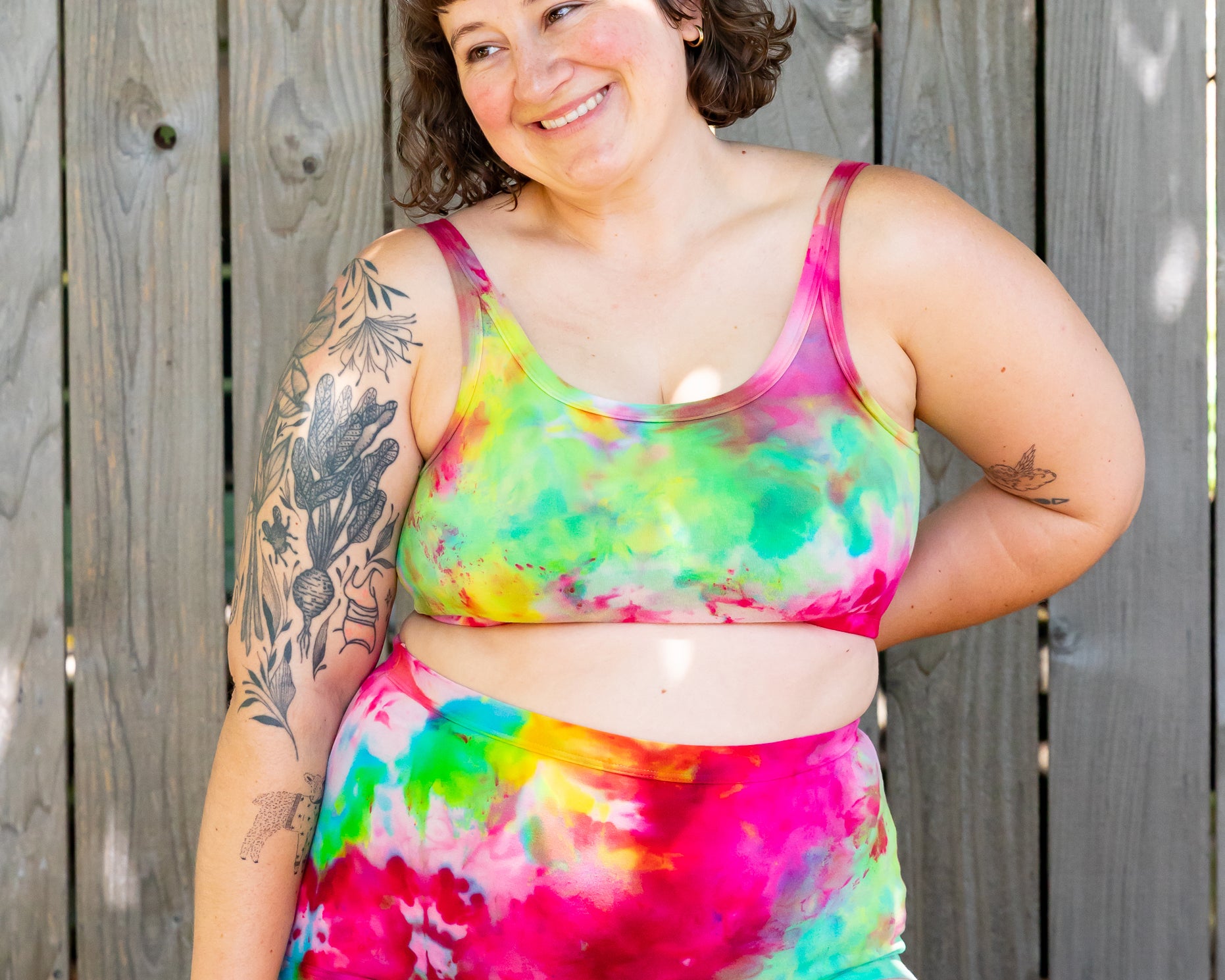 Model wearing Thunderpants Sky Rise style underwear and Longline Bra in Summer Crush Ice Dye - pinks, blues, yellows. 