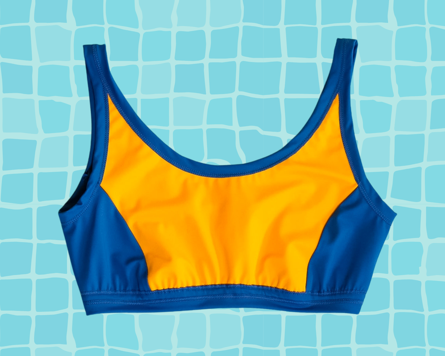 Flat lay of Thunderpants US yellow and blue paneled Swimwear Top. 
