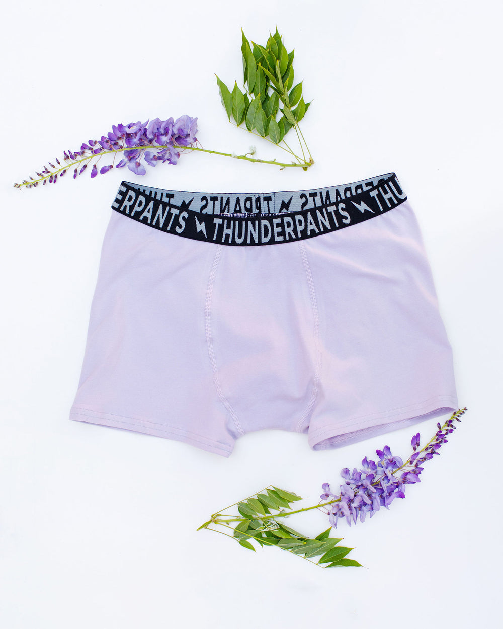 Flat lay of Thunderpants Boxer Brief style underwear in Wisterial Girl - a purple/grey color.