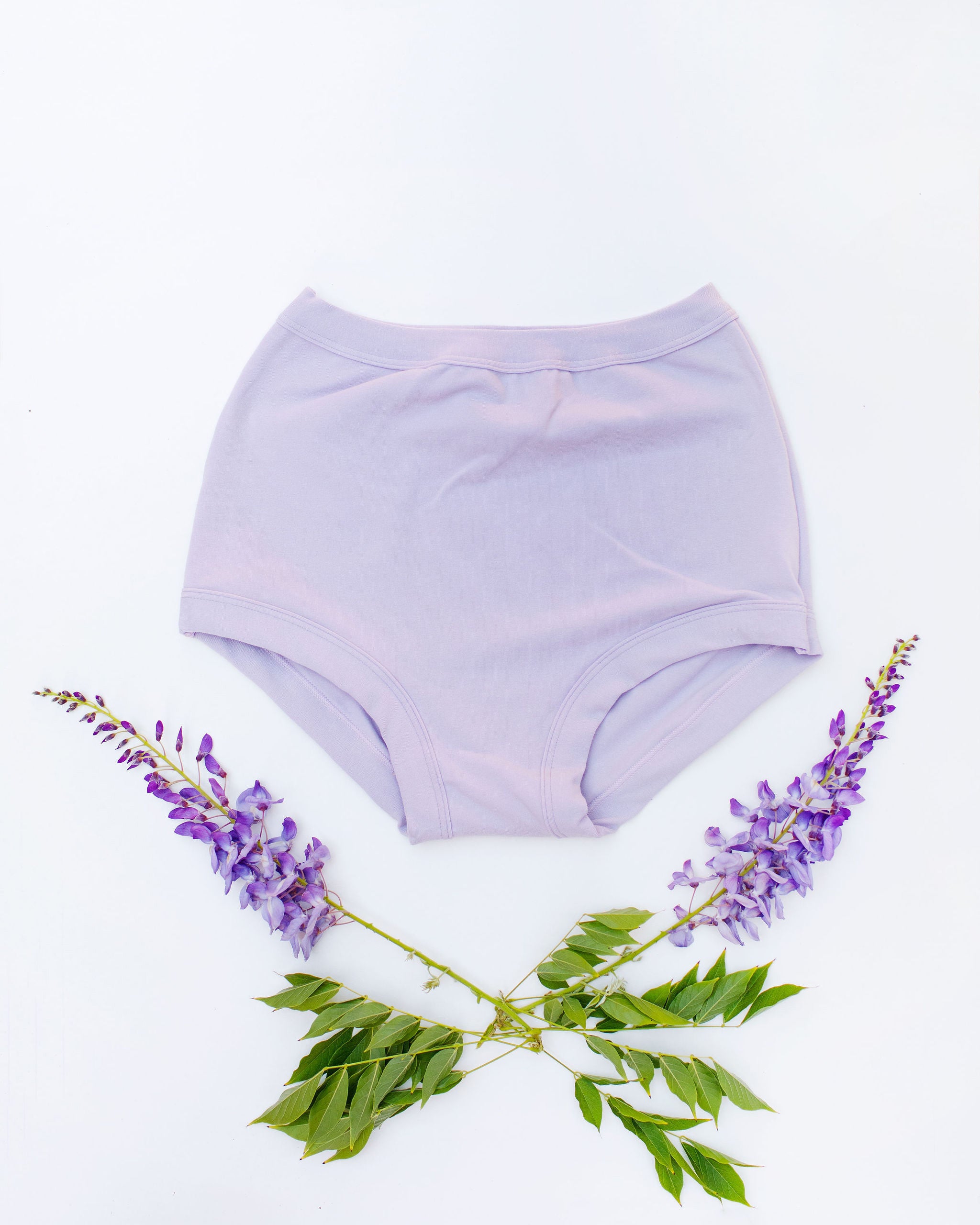 Flat lay of Thunderpants Sky Rise style underwear in Wisterial Girl - a purple/grey color.