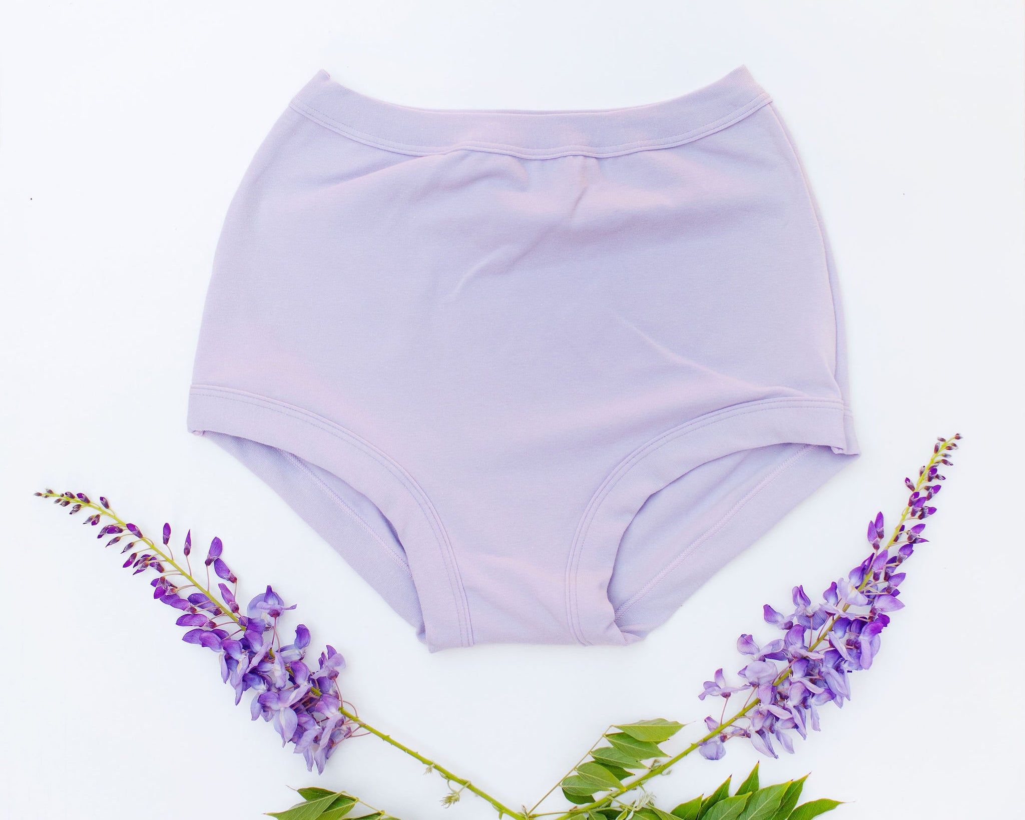 Flat lay of Thunderpants Sky Rise style underwear in Wisterial Girl - a purple/grey color.